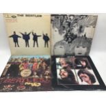 COLLECTION OF 4 BEATLES LP RECORDS. The first three found here on Yellow/Black Parlophones. ?Sgt