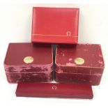 Four genuine Omega wristwatch boxes.