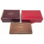 Three Longines wristwatch boxes.