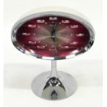 1960s manual wind space age "Rhythm" alarm clock on chrome base.