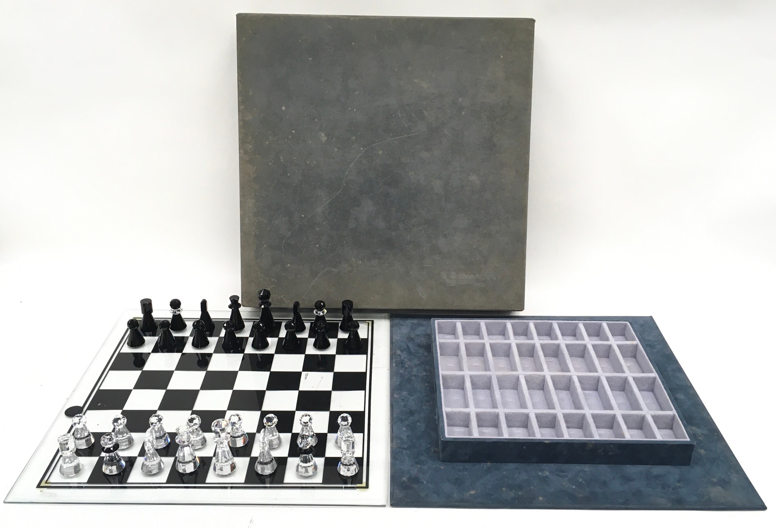 Swarovski complete chess set to include board in velvet presentation case.