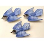 Three Poole Pottery bluebird wall plaques. 1 x shape 2 and 2 x shape 3, shape 3 are approx 15cm