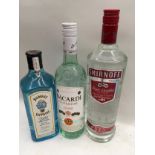 1l Smirnoff vodka, 70cl Bombay Sapphire gin and 70cl Bacardi superior. (13)
