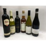 Six bottles of various wines. (11)