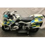 A Police electric kids ride on motorcyle. (ref 5)