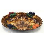 Majolica decorative fruit bowl with brown glaze.