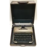 Vintage Remington typewriter in case.