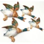 A set of four Beswick graduated wall mounted ducks.