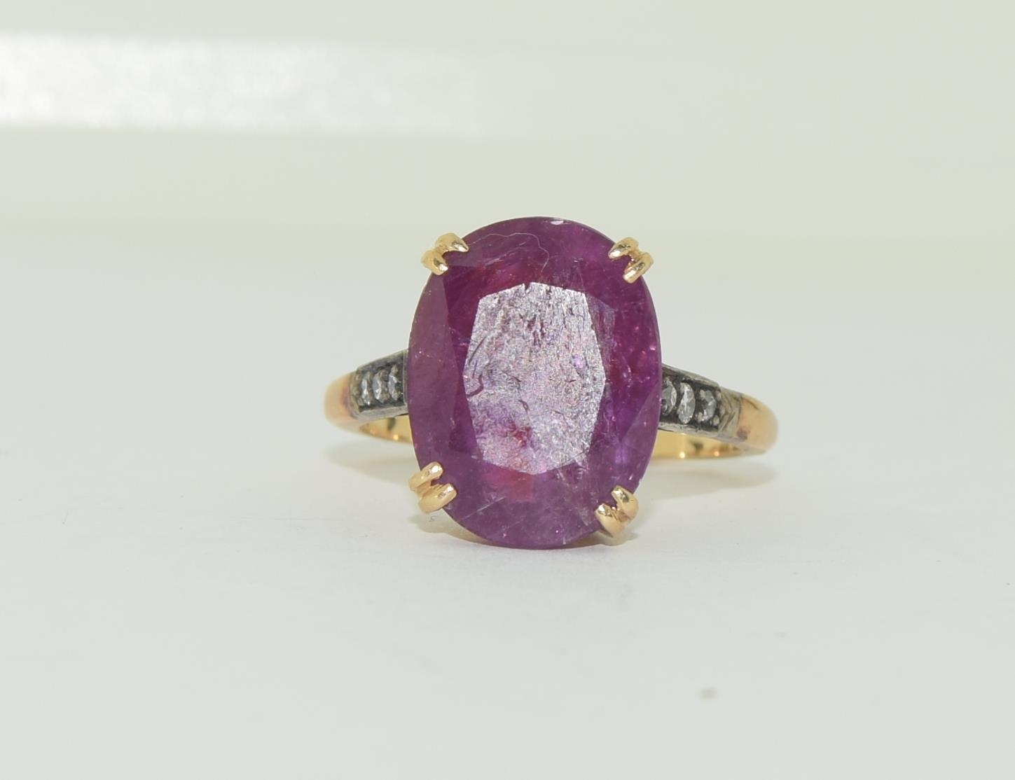 18ct ruby and diamond ring. Size N