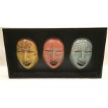 Large 3D wall hanging display of 3 face masks, overall size 29.5" x 15.5".