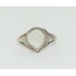 A 925 silver and moonstone ring, Size Q