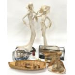 Two contemporary resin figures on bases together with a collection of ships in bottles (being sold