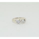 A heavy 925 silver and CZ double heart ring Size O