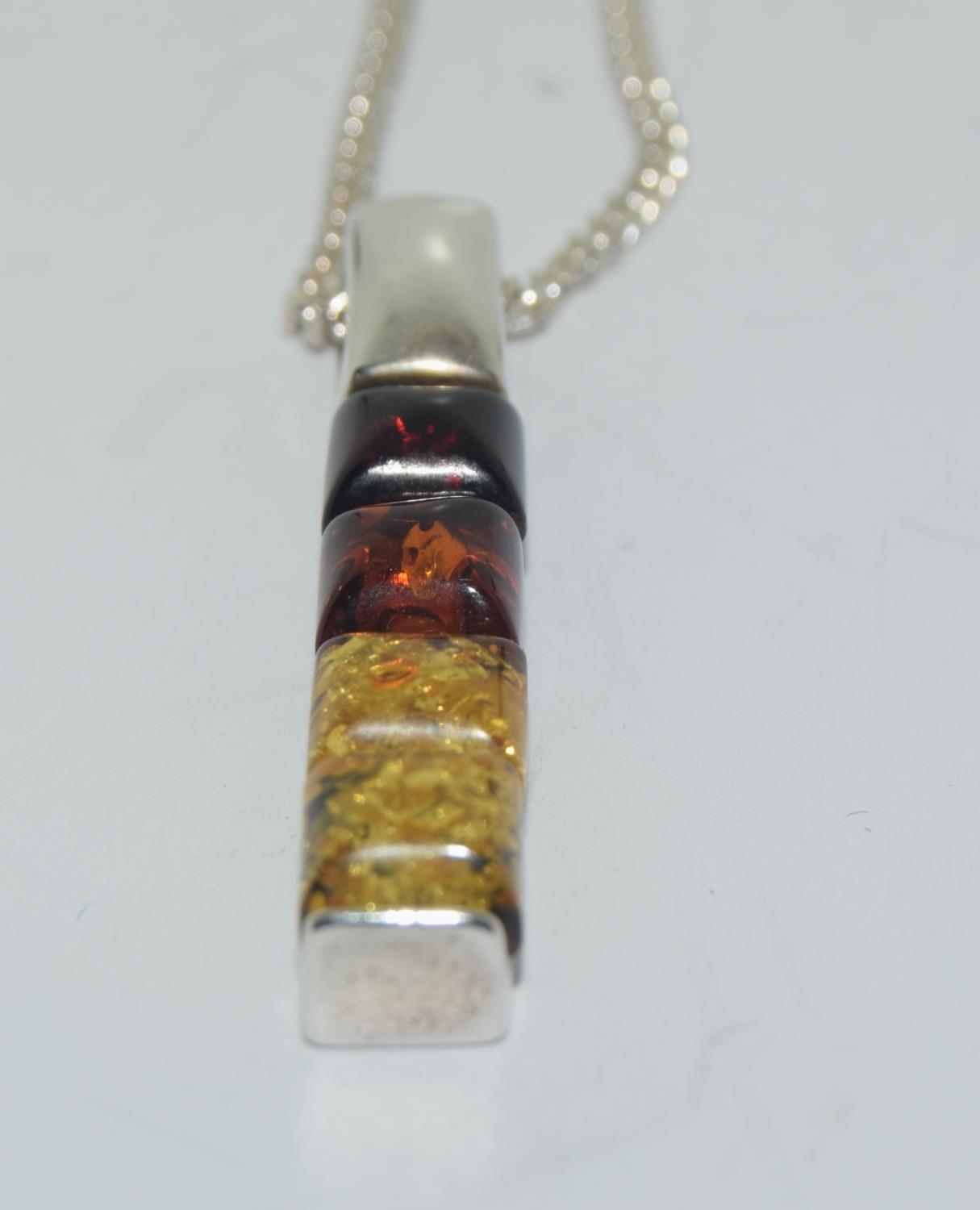 Multi coloured baltic amber 925 silver line pendant. - Image 2 of 3