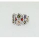 A multi gem set 925 silver ring, Size S.