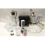 A collection of glassware to include Claret jugs, paperweights etc. and a pair of binoculars.