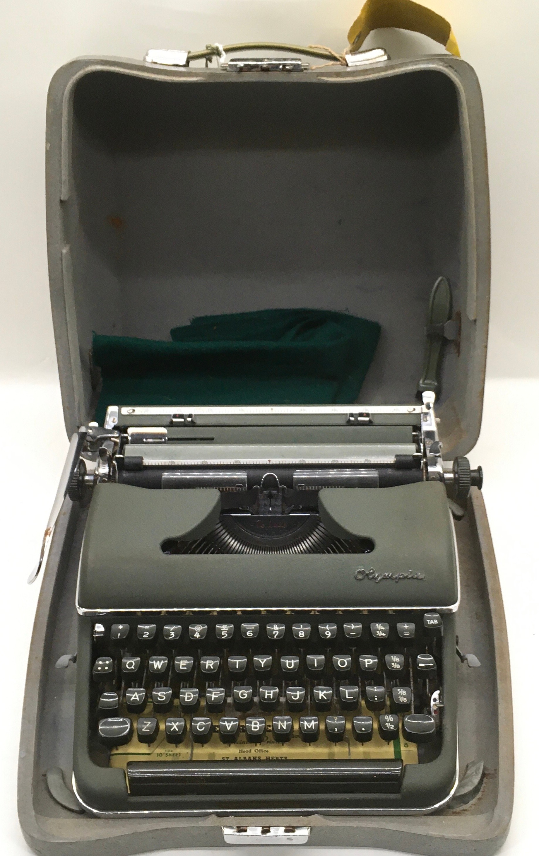 Vintage Olympia typewriter in original metal case