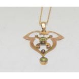 Edwardian Peridot seed pearl, 9ct gold pendant on 9ct gold chain.