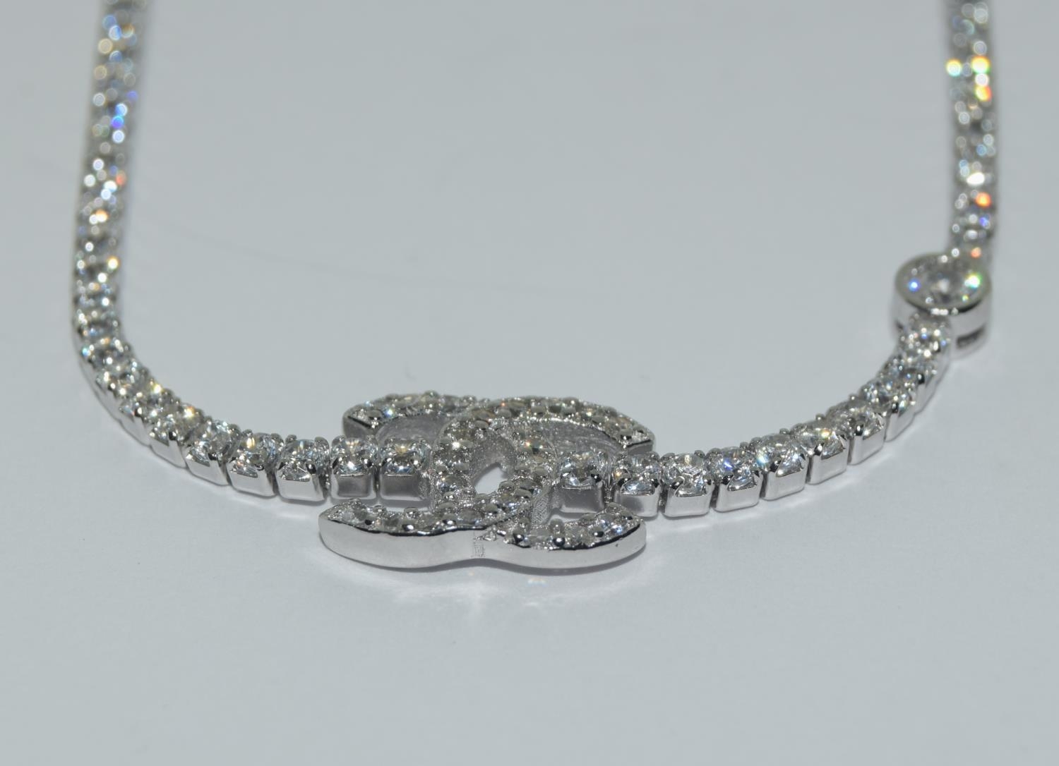 A silver & CZ designer style bracelet with size adjusters. - Image 2 of 4