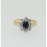 18ct gold ladies diamond and sapphire cluster ring size O