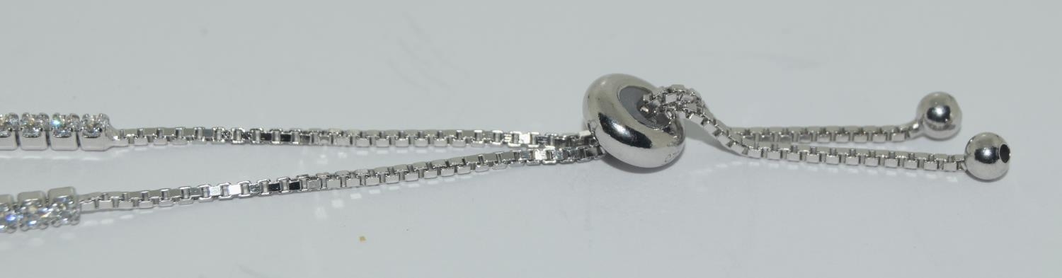 A silver & CZ designer style bracelet with size adjusters. - Image 3 of 4