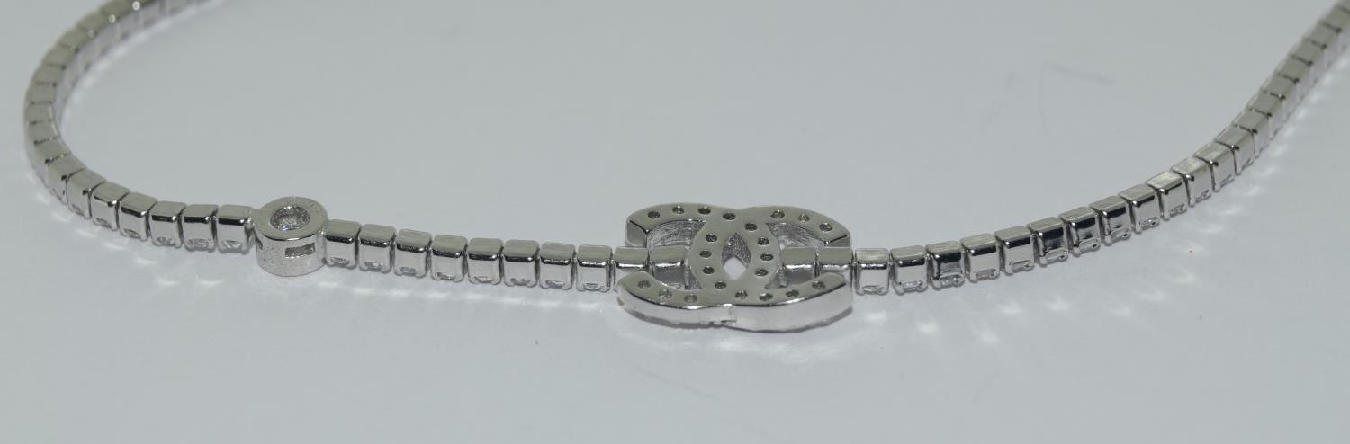 A silver & CZ designer style bracelet with size adjusters. - Image 4 of 4