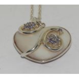 A large Mother of Pearl/Tanzanite 925 silver heart pendant.