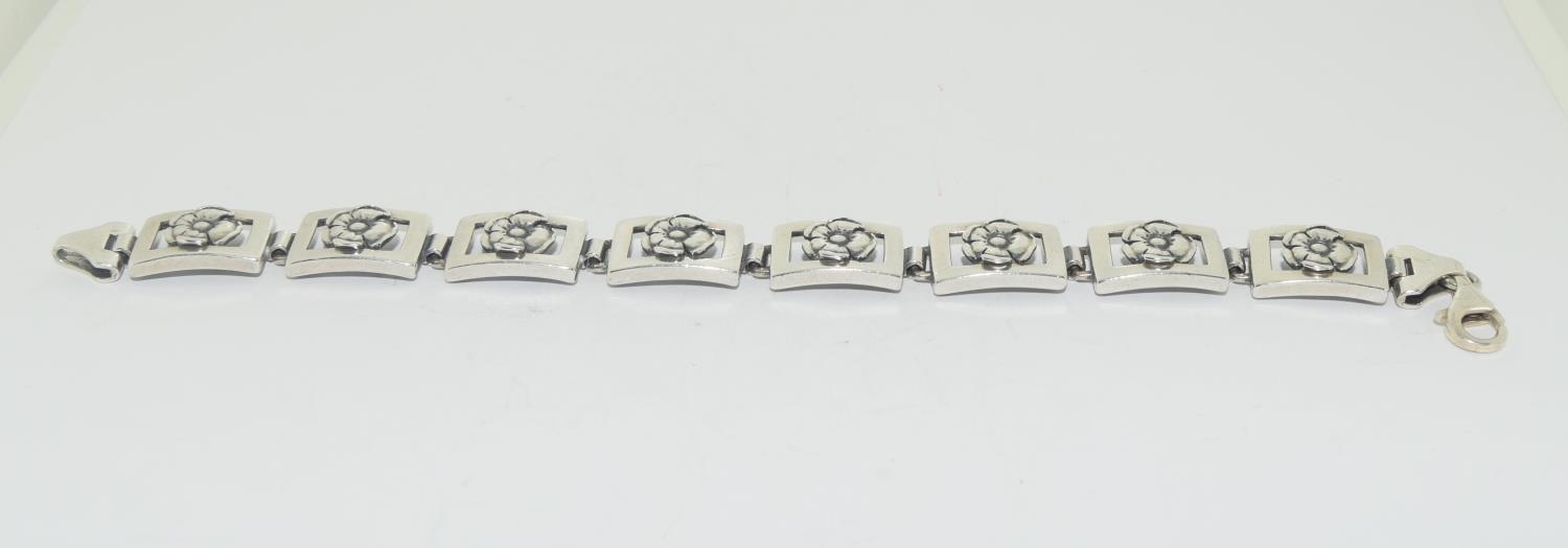 Substantial 925 silver daisy panel bracelet.