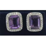 A pair of silver, amethyst and CZ earrings