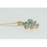 9ct Gold blue Zircon necklace.