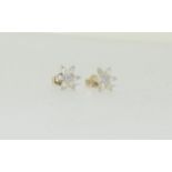 9ct Gold diamond flower earrings.