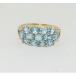 9ct yellow gold ladies Aquamarine triple bar cluster ring size P