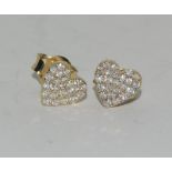 A pair of 9ct yellow gold heart shaped diamond earrings 25 points
