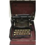Antique 19th/early 20th century typewriter in case.