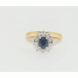 18ct gold ladies diamond and sapphire cluster ring size M