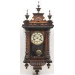 Vintage oak cased wall clock with Wurttemberg mechanical movement. Dial signed M H Tilley & Son