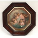 Antique Reynolds picture of cherubs in octagonal oak frame 37x37cm.