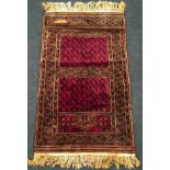 A small vintage threshold carpet 105x63cm.