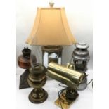 A quantity of vintage lighting to include a Tilly lamp and paraffin lamps. 5 items in lot