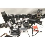 Quantity of vintage cameras to include 110, 126 and 35mm film examples as well as a digital Canon