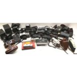 A large quantity of vintage film cameras in 35mm, 126 and 110 format. To include Zeiss, Minolta,