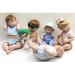Five Ashton Drake porcelain collectors dolls.