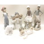 6 pieces of Lladro porcelain to include singing cherubs and a polar bear