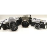 Collection of quality vintage 35mm film cameras to include Japan made Olympus Trip, Ricoh Singlex