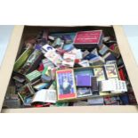 A large box containing a collection of matchboxes and matchbooks from around the world c/w a list of