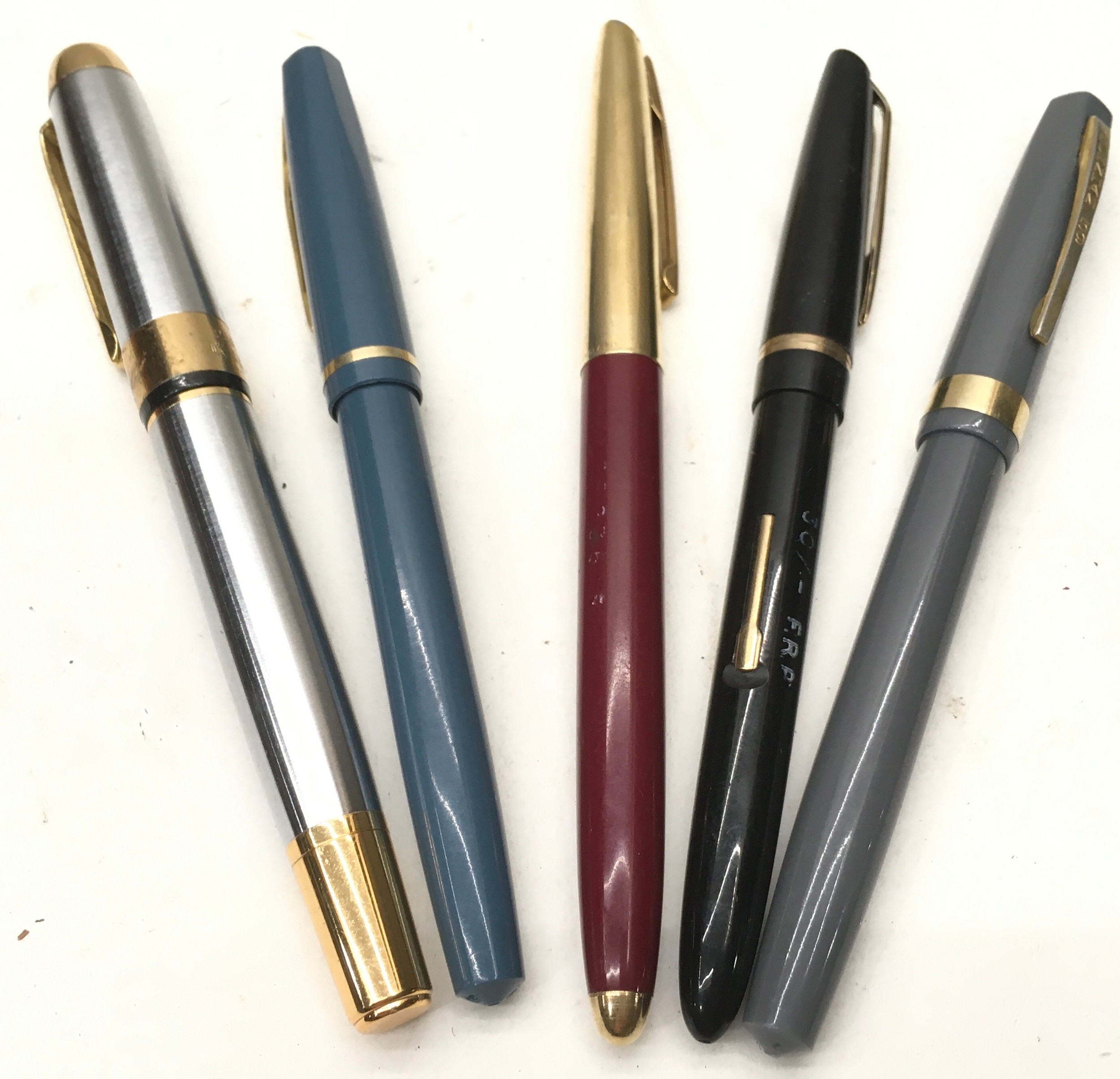 Small collection of Fountain pens including Waterman. Some with advertised gold nibs. 5 in all