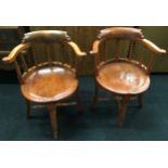 Pair hard wood round back carver chairs with central turned front leg and turned back supports