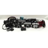 A collection of assorted cameras.