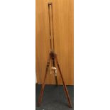 A vintage wooden easel 136cm tall.