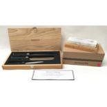 Set of "Kamikoto Knives" set in a ash wooden box. Blades are 8", 7"and 5" with certificate of